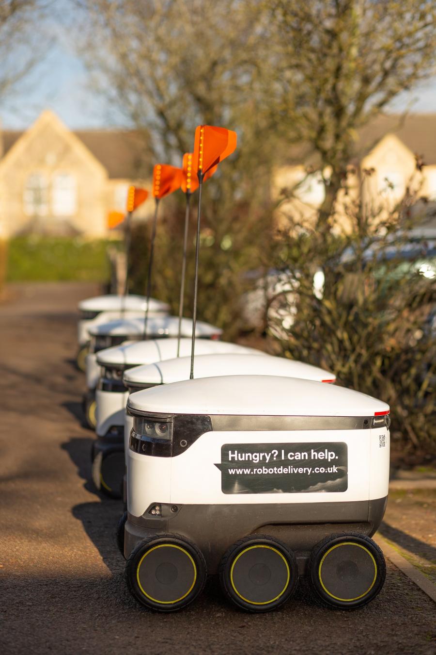 starship robots lined up on pavement