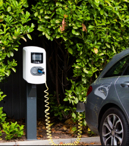 Photo shows an Alfen Eve Double Line charger charging an electric car