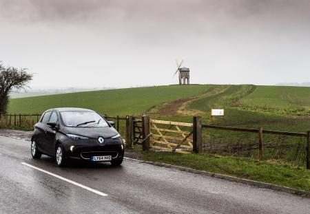 Car Club car with windmill in the background