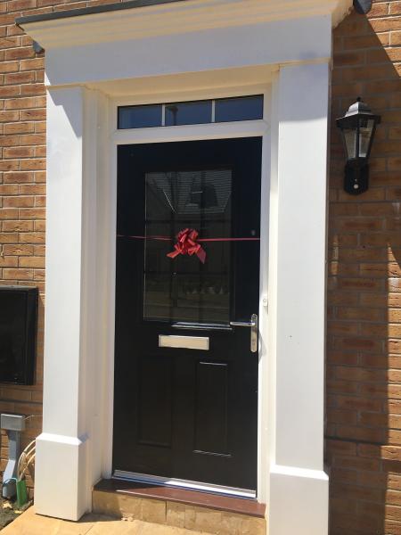 new house front door with bow