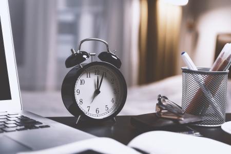 A clock on a desk