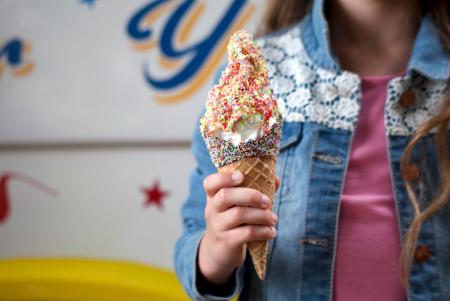 ice cream sprinkles cone girls hand